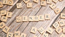 scrabble letters spelling out the word gender